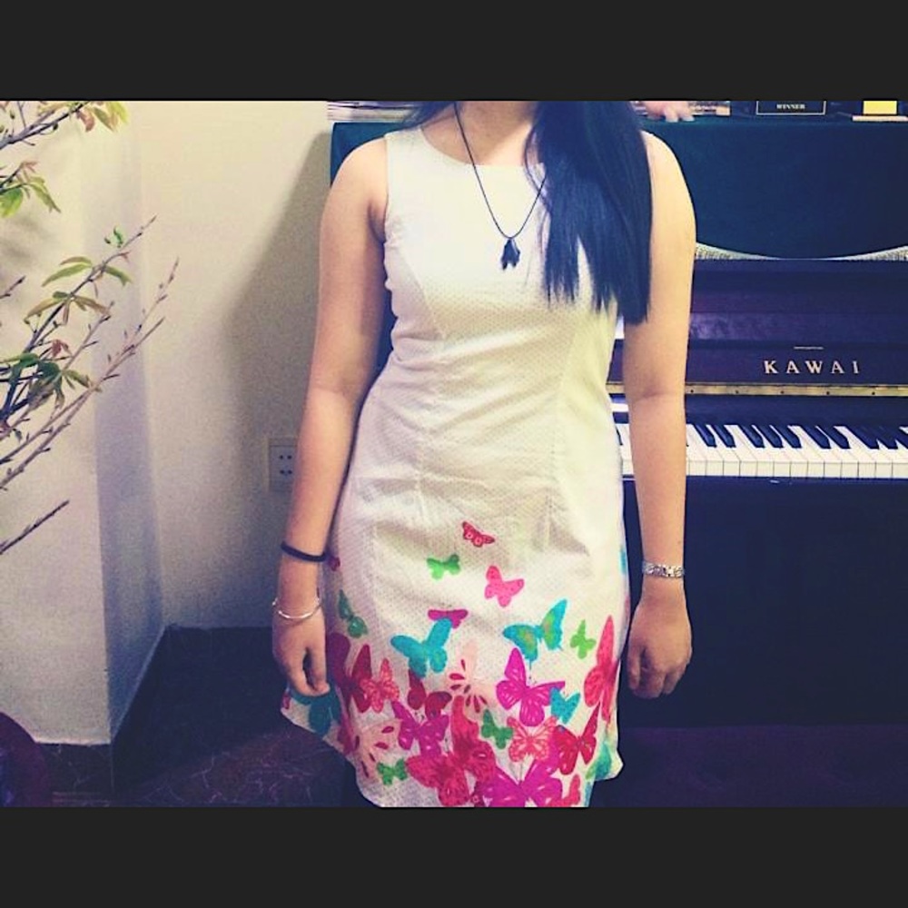 Tailored white sheath dress with floral